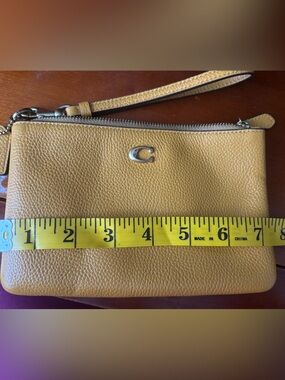 Coach Mustard Yellow Pebbled Leather Wristlet Clutch